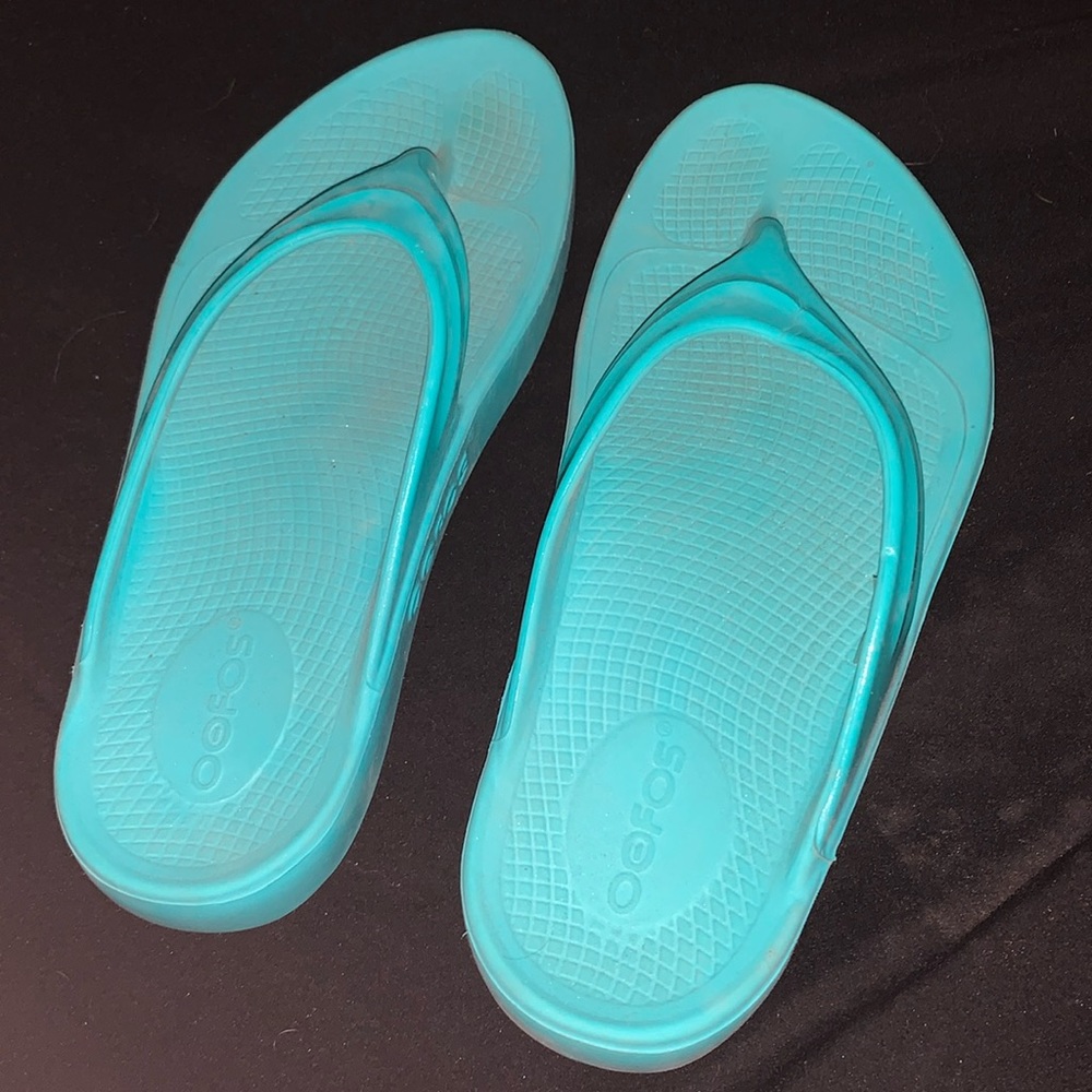 Turquoise flip flops